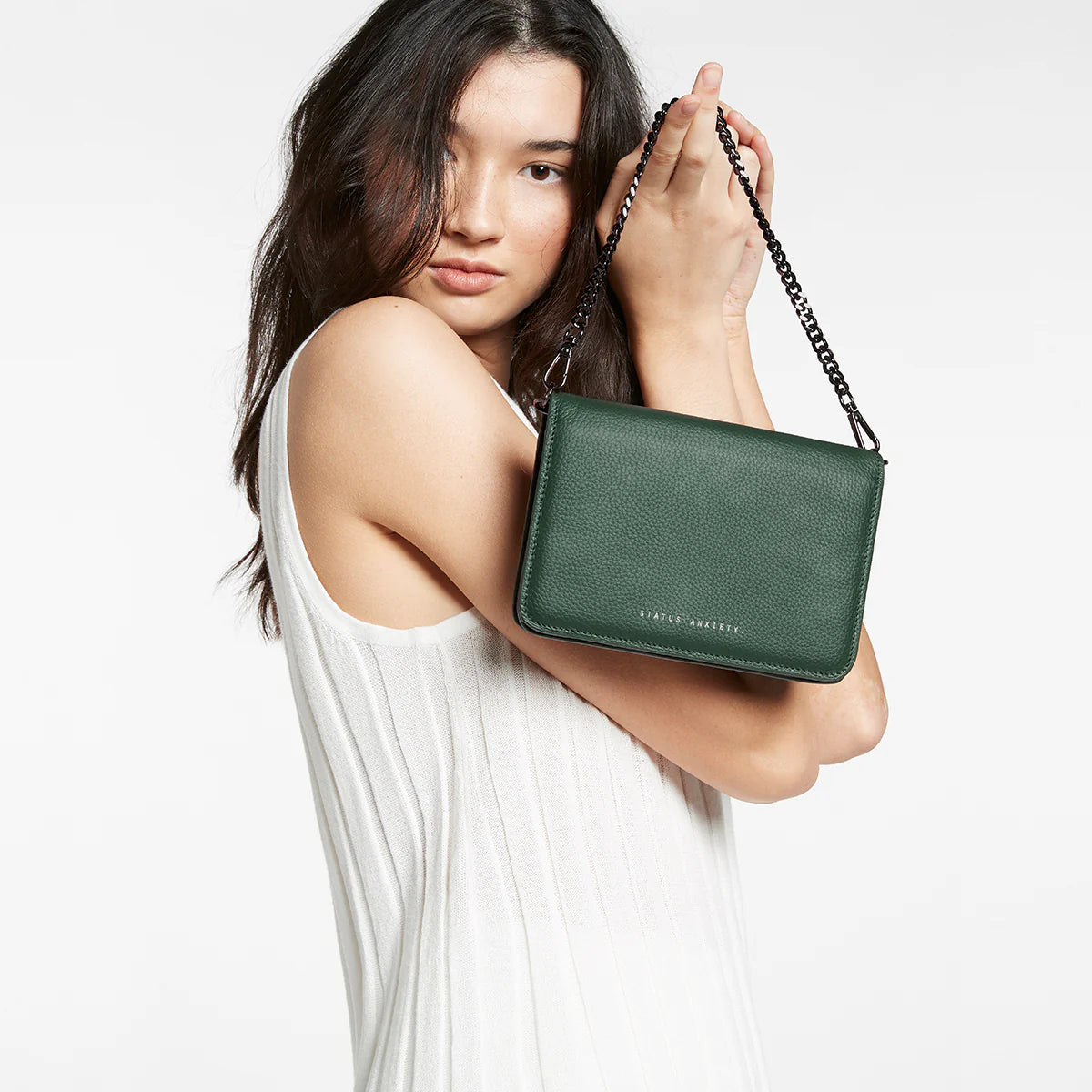 Status Anxiety She Burns Bag in Green
