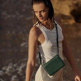 Status Anxiety She Burns Bag in Green