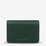 Status Anxiety She Burns Bag in Green